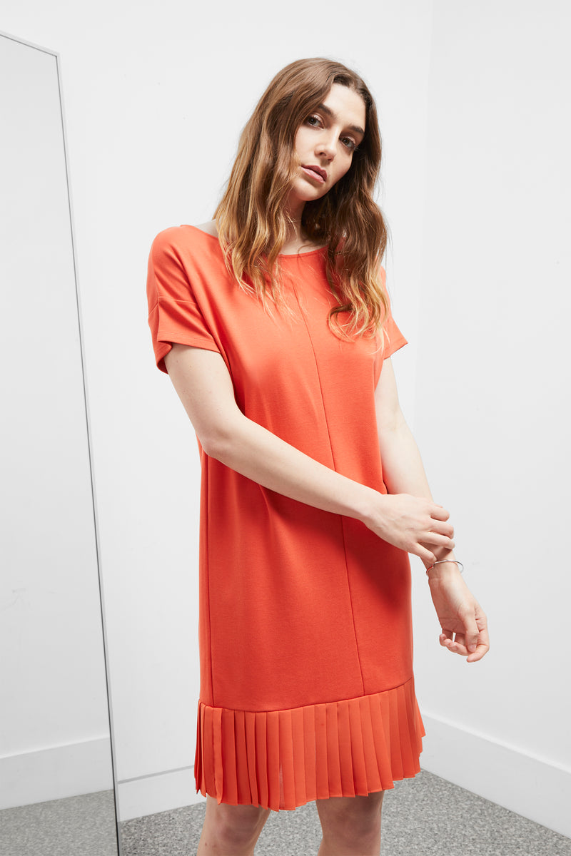 Dress with pleated online hem